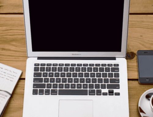 Mac Book Air and a cup of Coffee
